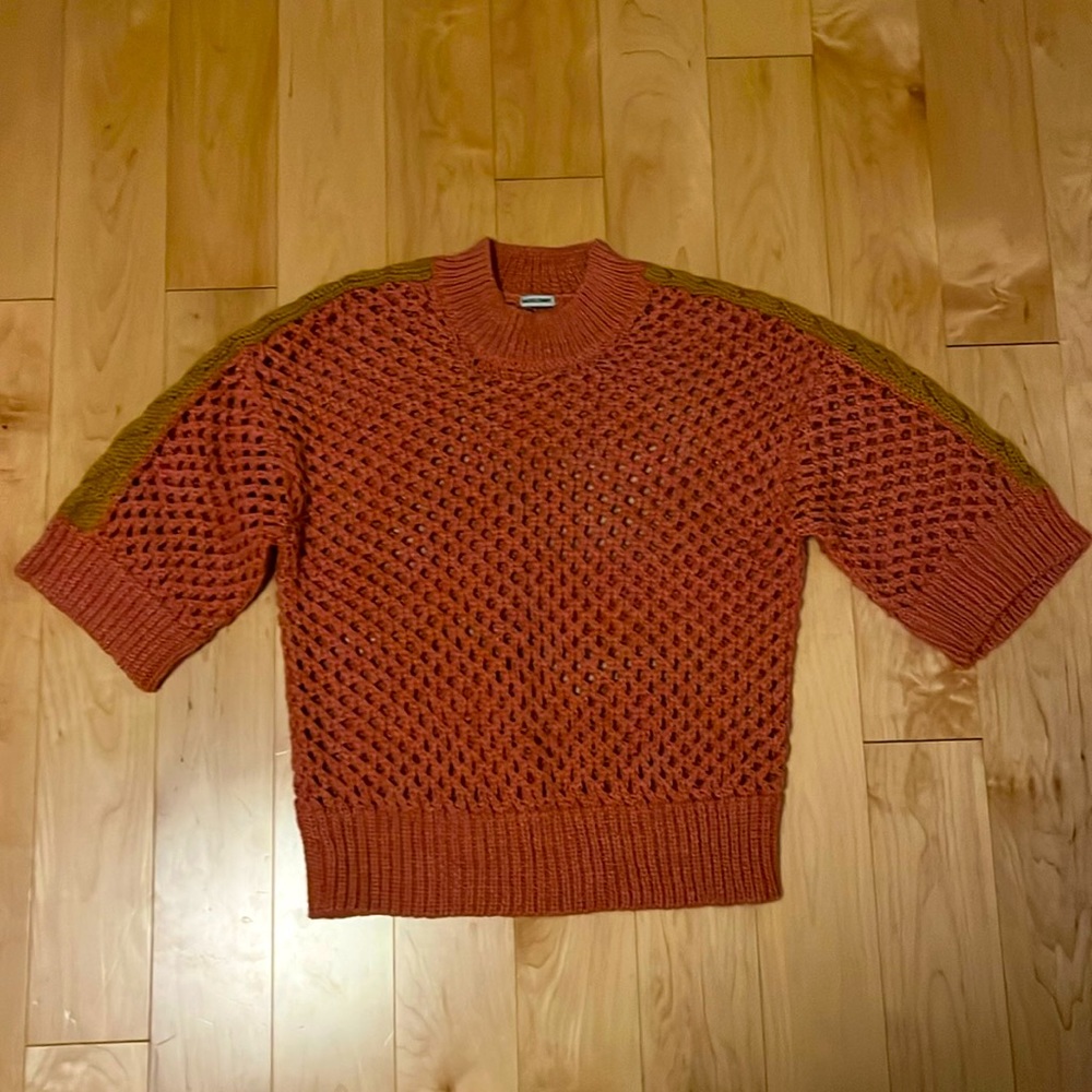 Red-orange knit sweater